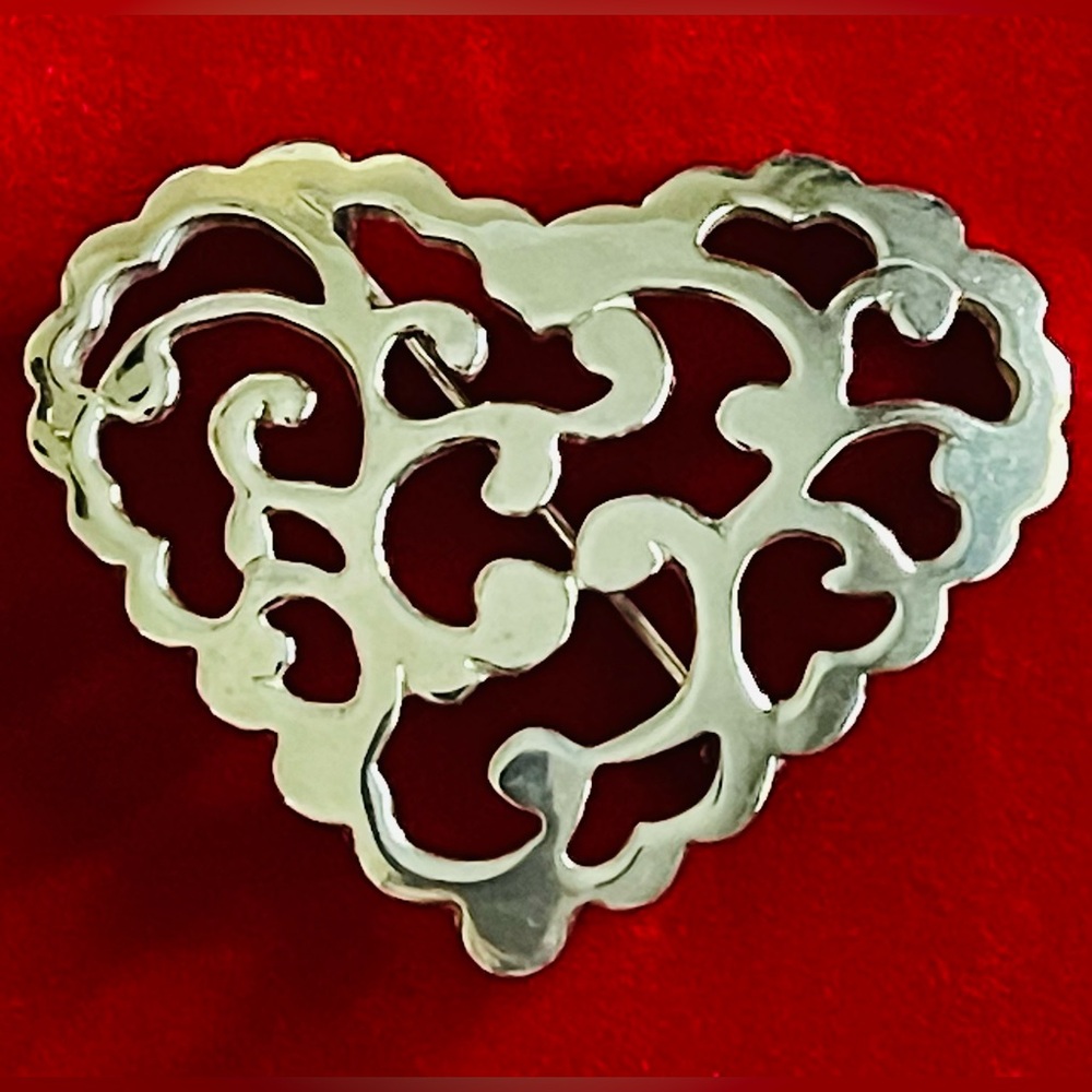 Valentine Atrium heart pin, silver tone scrolled cut out. 
2”x 2 1/2” Never Worn